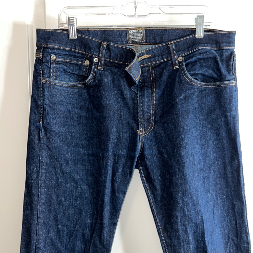 Men’s jeans wore once.